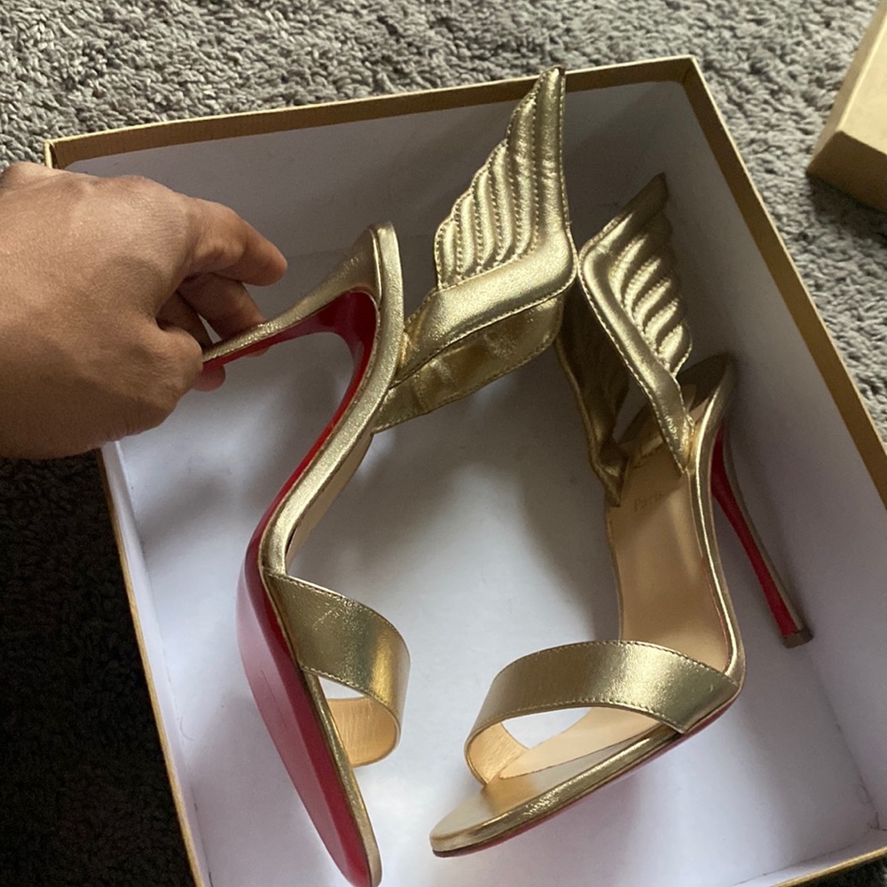 Christian Louboutin gold wing heel sandals